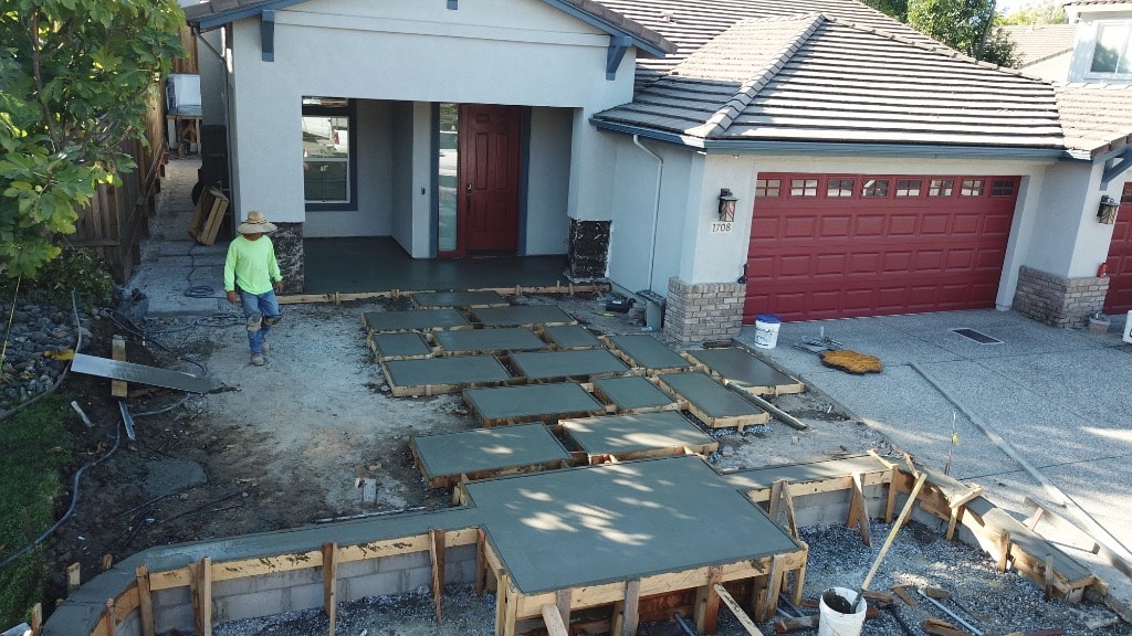 Driveway concrete pouring construction in progress